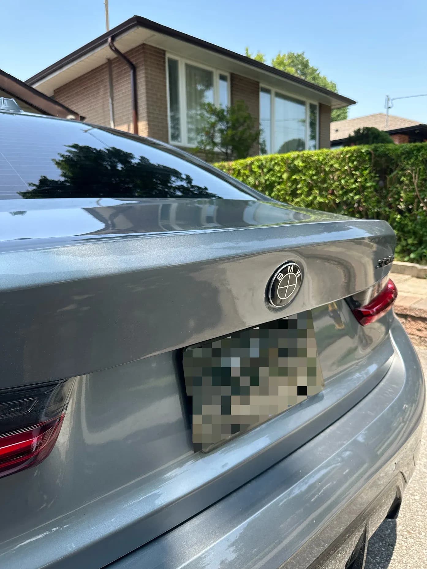 BMW 330i. Trunk lid dent repair after
